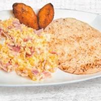 Arepa Con Queso Y Huevos Con Jamon · Scrambled eggs with ham and corn cake with cheese.