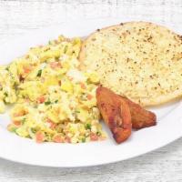 Arepa Con Queso Y Huevos Revueltos · Scrambled eggs with melted cheese corn cake.