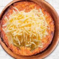 Arepa De Choclo Con Queso · Sweet corn cake with cheese.