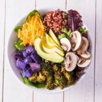 Paniolo · Spring mix, avocado, cheddar, mushrooms, bacon, purple sweet potatoes, kimchi broccoli, and ...