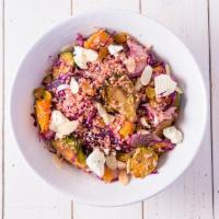 Endless Summer Grain Bowl · Quinoa, purple cabbage, roasted beets, radish, kimchee broccoli, purple potatoes, almonds, b...
