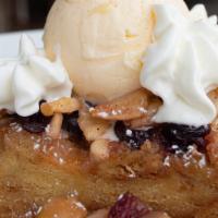 Apple Bread Pudding · cranberries, gran marnier sauce, vanilla ice cream