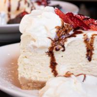 Cheesecake · Vanilla sour cream, strawberry sauce
