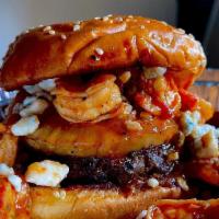 Island Fling  · Our burger topped with a grilled pineapple slice and sautéed shrimp in our secret sauce and ...