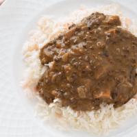 Dal Makhani · Lentils fried in butter with onions, tomatoes, ginger, and garlic.