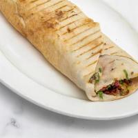 Falafel Pita Sandwich · Chickpea fritters, tomatoes, parsley, pickled turnips, tahini sauce