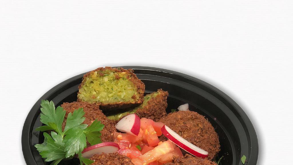  - Trad. Falafel · Made with chickpeas, onions, cumin and parsley.