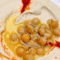  - Hummus · Pureed chickpeas with tahini sauce and lemon juice.