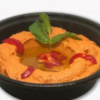  - Spicy Hummus · Pureed chickpeas with tahini sauce and lemon juice mixed with capsicum.