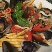 Cavatelli Seafood · Homemade Fresh Cavatelli Served w/ Calamari Clams, Mussels Shrimp, and Cherry Tomato Sauce.