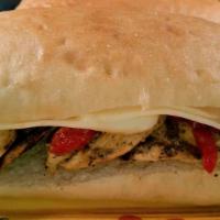 Michael Angelo · Fresh grilled chicken, roasted red peppers, mozzarella cheese drizzled with balsamic vinegar.