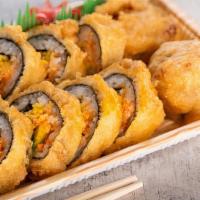 Flying Fire Dragon Roll · Tempura salmon roll with mango, & red onions, topped with a spicy sauce.
(flour & vegetable ...