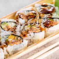 Grilled Salmon Roll · Roll with grilled salmon, avocado, & cucumber, topped with teriyaki sauce.