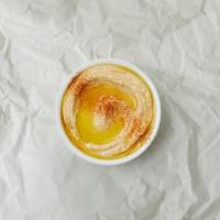 Hummus · Classic chickpea puree with tahini, lemon, and garlic.
