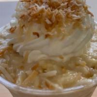 Coconut Tres Leches · A vanilla sponge cake soaked in a mixture of coconut milk filled with coconut cream and toas...