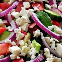 Spring Salad · Mix of tomatoes, cucumbers, scallions, red radish, fresh herbs and boiled eggs tossed with s...