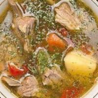 Shurpa · Traditional uzbek soup in natural beef broth with chunks of beef, carrots, potatoes, chick p...