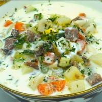 Okroshka · Cold yogurt soup with meat and boiled vegetables.