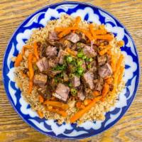 Authentic Uzbek Plov · The most traditional dish! Mix of beef & lamb with carrots, rice, chickpeas and traditional ...