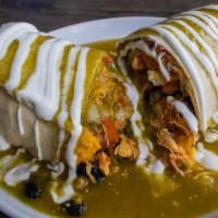 Tex Mex Burrito · Smoother in our salsa verde. Inside contains Rice, Beans, Pico de gallo, lettuce, cheese, to...