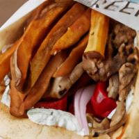 The O.G. Gyro · The O.G Gyro - Traditional Pork, Grape Tomatoes, Red Onions & Homemade Tzatziki and is toppe...