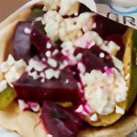 The Vegetarian Gyro · The Vegetarian Gyro - Roasted Eggplant Spread, Pickled Beets, Grilled Zucchini, Sautéed Bell...