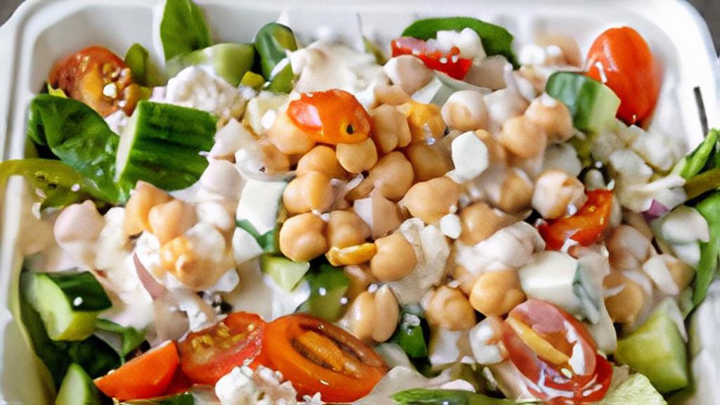 Chickpea Salad · Chickpea Salad - Spinach, Grape Tomatoes, Red Onions, Bell Pepper, Feta Cheese, Cucumbers, Chickpeas and Dreamy Tahini Sauce