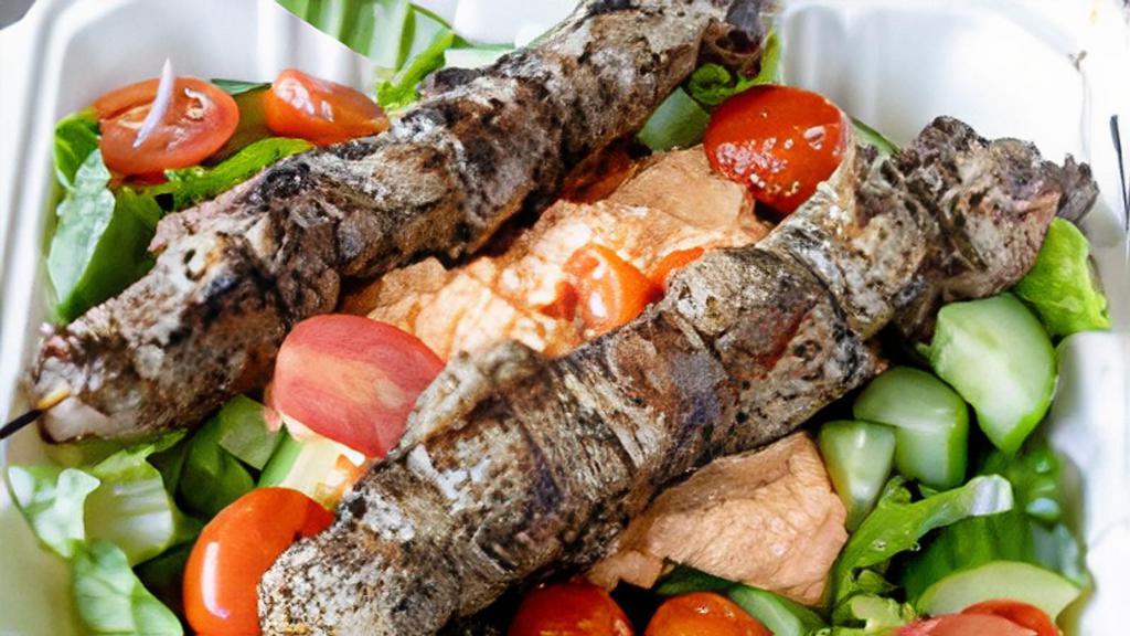 Keto Salad · Keto Salad - Shredded Romaine, Pork Kabob, Cucumbers, Grape Tomatoes, Spicy Feta with Lemon Herb Vinaigrette
