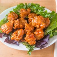 Popcorn Chicken · Tender pieces of chicken prepared in our signature beer batter available in bbq, honey bbq, ...