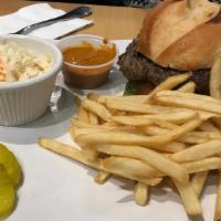 The Hot Spot Burger · Beef burger served on a brioche with lettuce, grilled tomatoes, grilled jalapenos, and a spi...