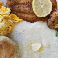 Fish And Grits · Served with organic 5 grain toast and two eggs to your killing.