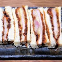 Katsu Sando · Japanese milk bread, fried pork cutlet, and hatch miso passion fruit jam.