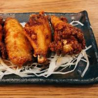 Chicken Wings · 4 pieces. Sweet soy glazed fried chicken wings.