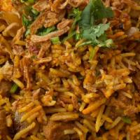 Vegetarian Biryani  · Supreme long grain Basmati Rice stir fried with veggies, onions ,spices &herbs.Side of yoghu...