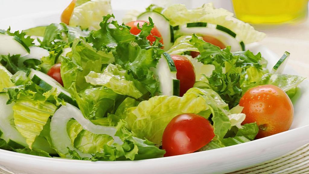 Garden Salad · Iceberg lettuce, red onion, cucumber, tomato and carrots.