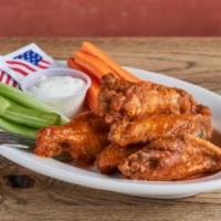 Chicken Wings · Choice of buffalo, BBQ or sweet spicy soy ginger. Served with choice of bleu cheese or ranch...