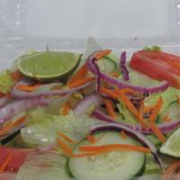 Garden Salad · Lettuce, tomato, cucumber, carrot and green pepper. حلال 🥗