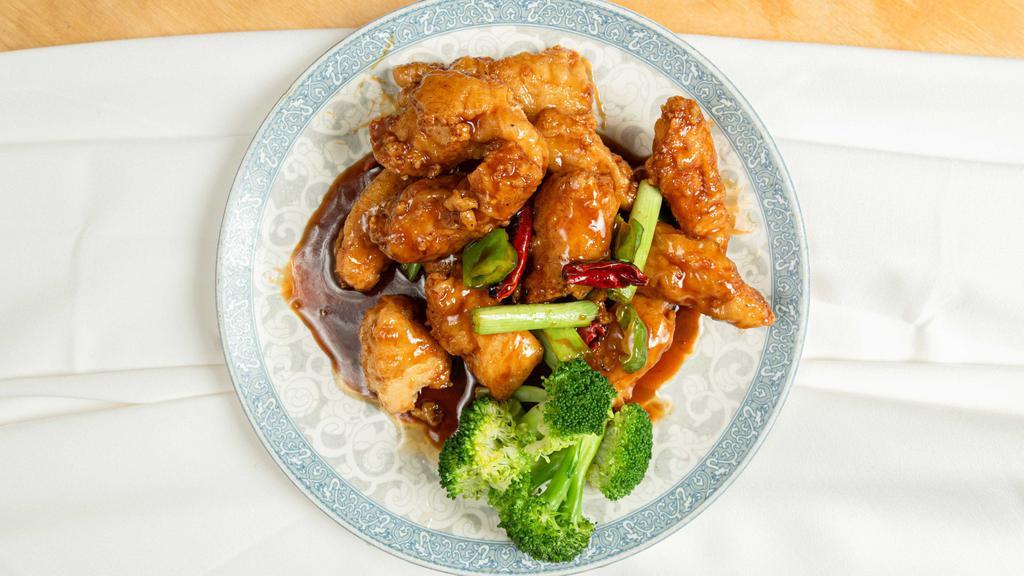 General Tso’S Chicken · Spicy. Chunks of spring chicken marinated and sauteed with red pepper in our special tangy sauce.
