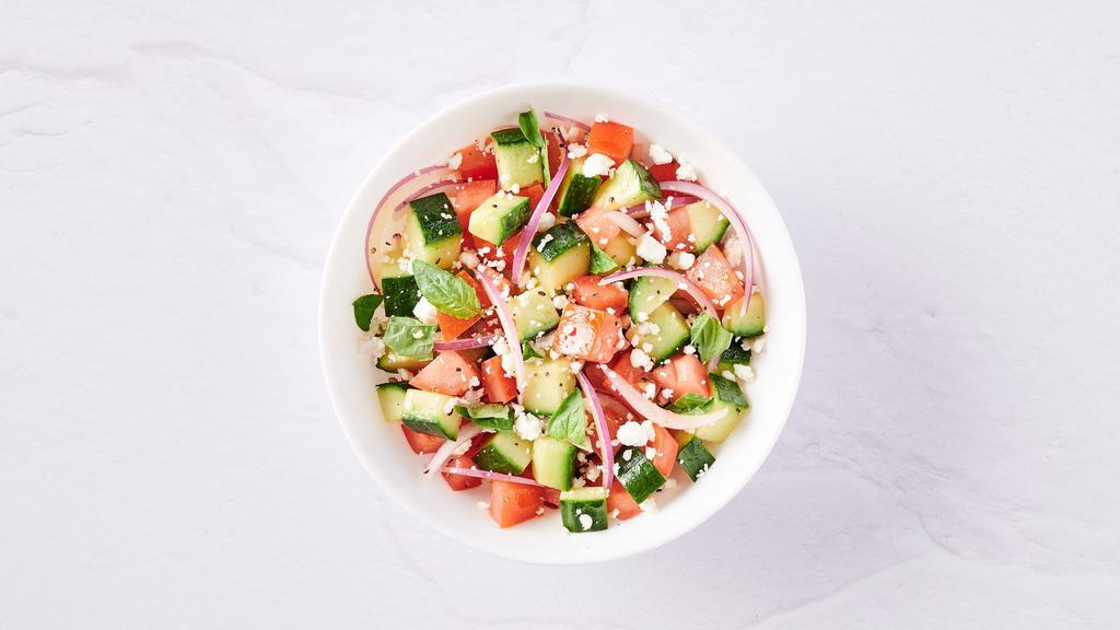 Cucumber Tomato Salad · Ripe cucumbers and tomatoes with fresh basil, balsamic vinegar, sliced red onion, and crumbled feta