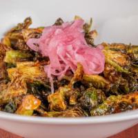 Crispy Brussels Sprouts · Honey sriracha and pickled red onion