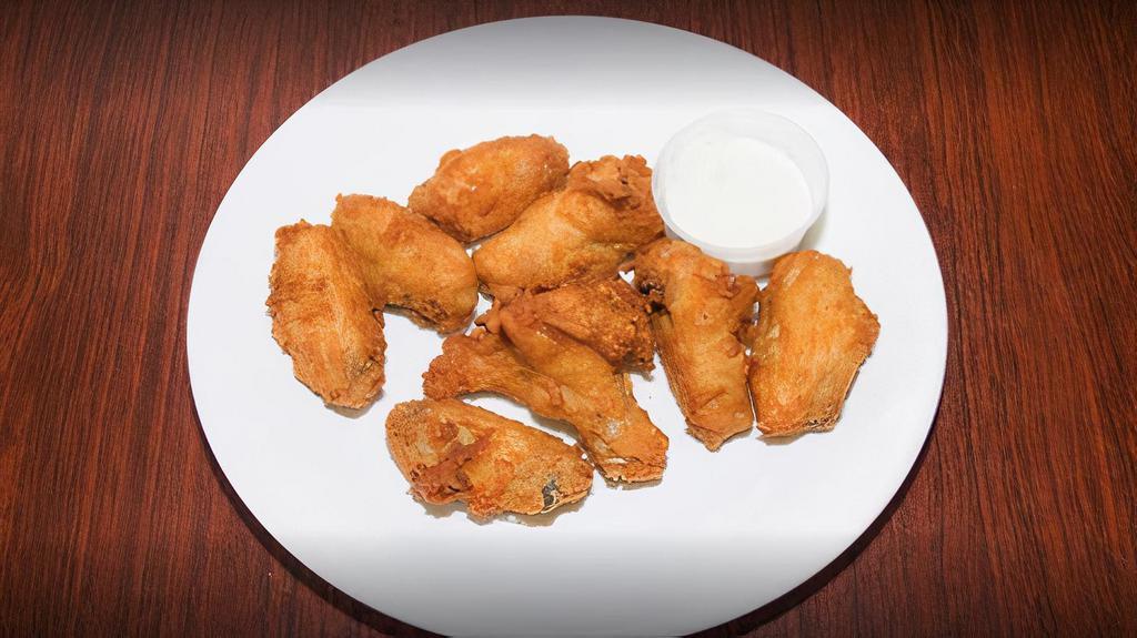 2 Wings · Deep-fried chicken wings with your choice of sauce.