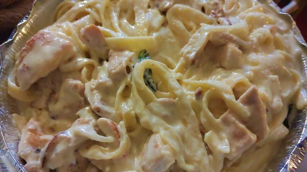 Fettuccine Alfredo · Add grilled chicken and salad for an additional charge.
