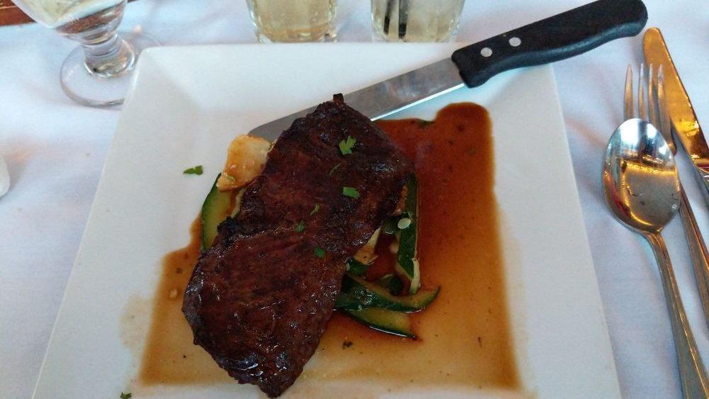 16Oz. Marinated Skirt Steak · Sliced skirt steak, spinach, mashed potato, chimichurri sauce.