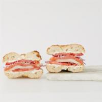 Orchard Street Sandwich · Nova Scotia salmon & sable, plain cream cheese, tomato, Bermuda. onion.