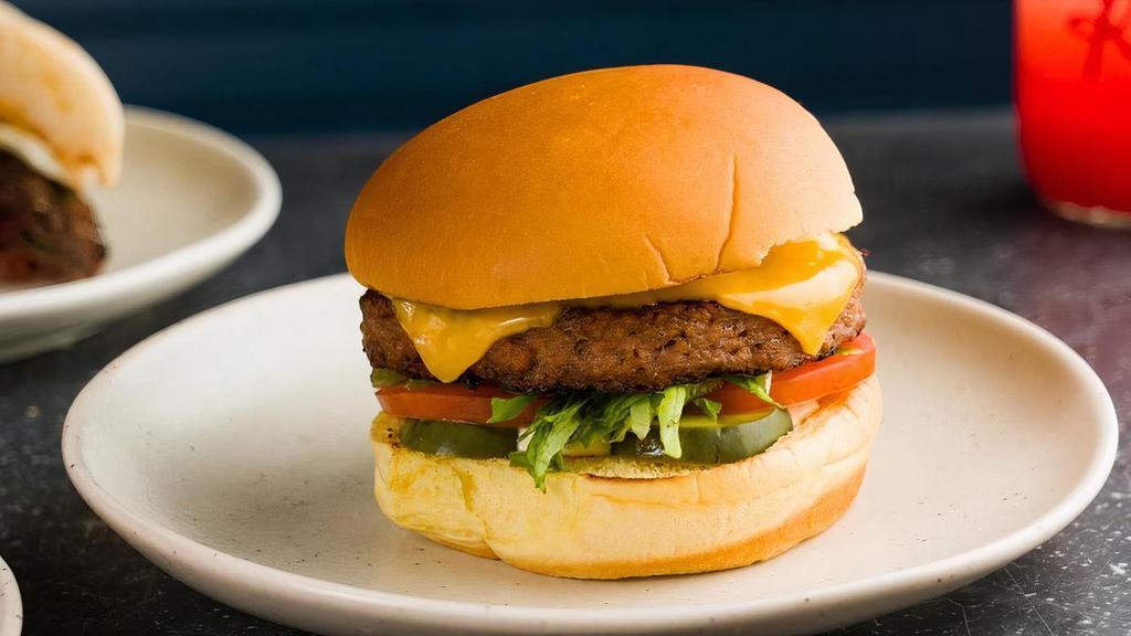 Beyond Burger · Beyond (Vegetarian) Patty, Lettuce, Tomato, Onions, Pickles, American Cheese & Special Sauce On A Potato Bun.