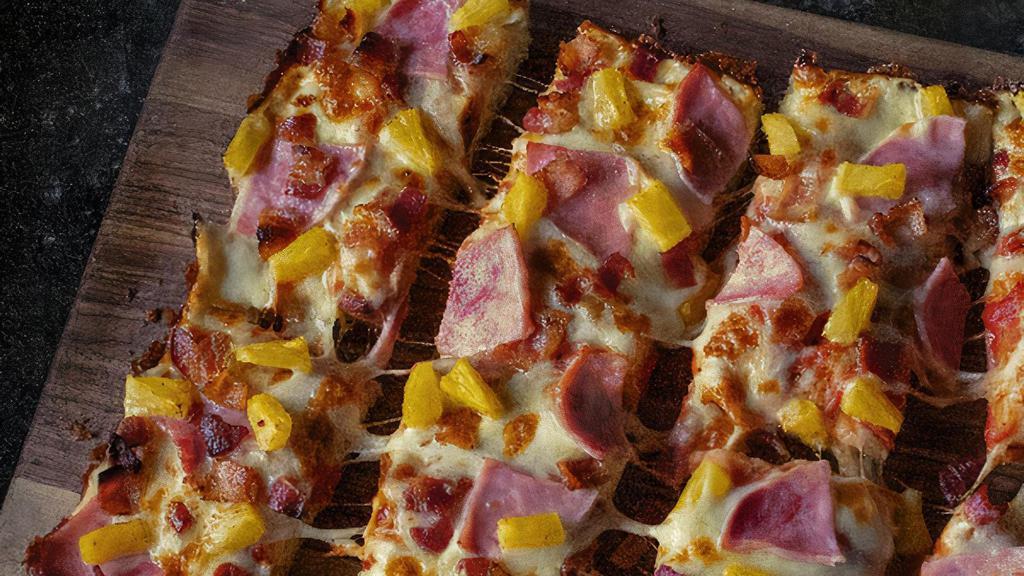 Hawaiian · Pizza sauce, premium mozzarella, ham (when in stock), bacon & pineapple. 270-390 cal. / slice