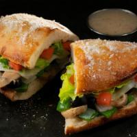 Veggie Deli Boat · Calzone style sandwich baked with pizza dough stuffed with provolone, onions, green peppers,...