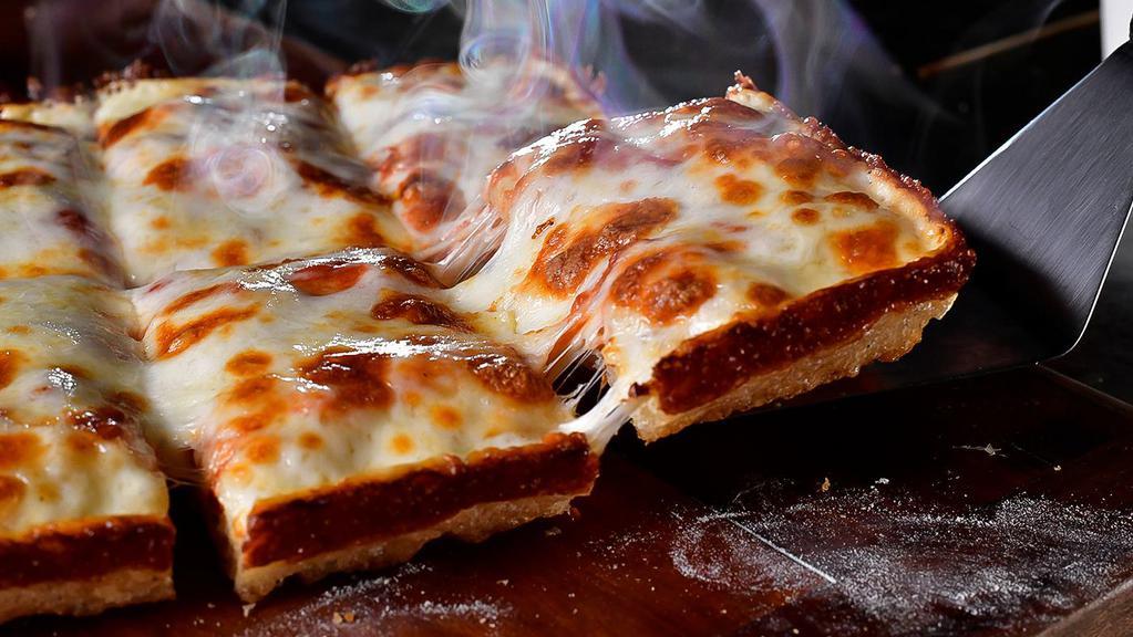 X-Large Cheese Pizza · 12 pcs. Build your own Detroit-Style Pizza topped with premium mozzarella & your choice of toppings.