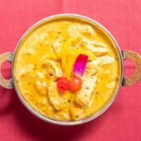 Chicken Korma · Chicken cooked in a slow-simmered almond-based sauce.