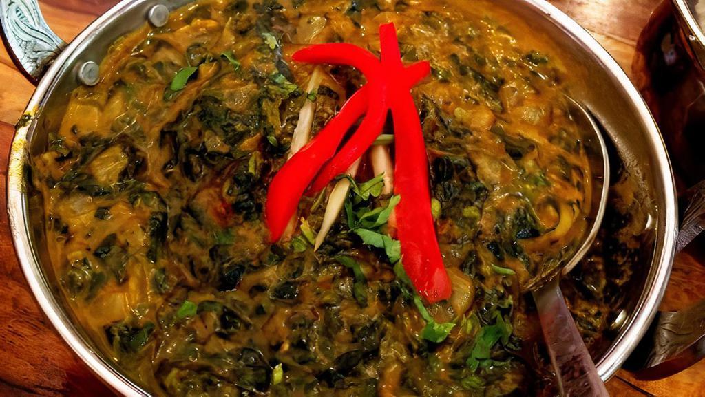 Shrimp Saagwala · Shrimp sautéed in spinach with a hint of spices.